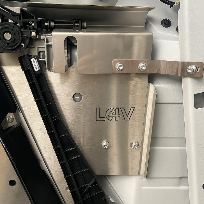 Internal shield for locking mechanism, wiring harness or handle
